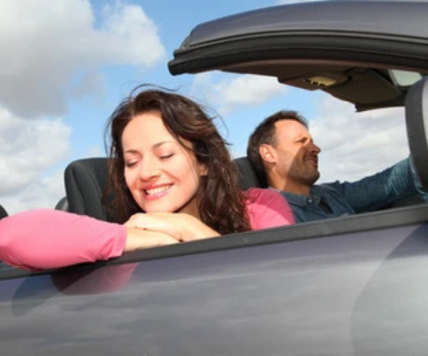 Self Drive vs Car with Driver visual featuring a chauffeur-assisted rental car service for comfortable city travel in Lucknow.